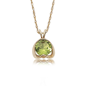 14KY 7MM RD-PERIDOT picture